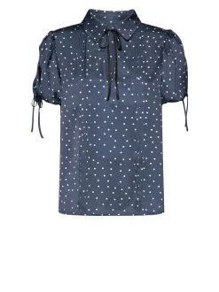 Blouse with micro-pattern and feminine details