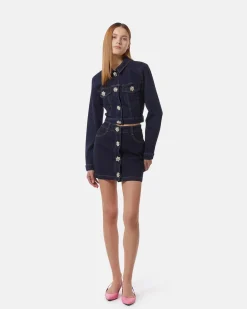 Dark denim miniskirt with jewel buttons