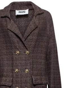 Double-breasted coat with decorative buttons
