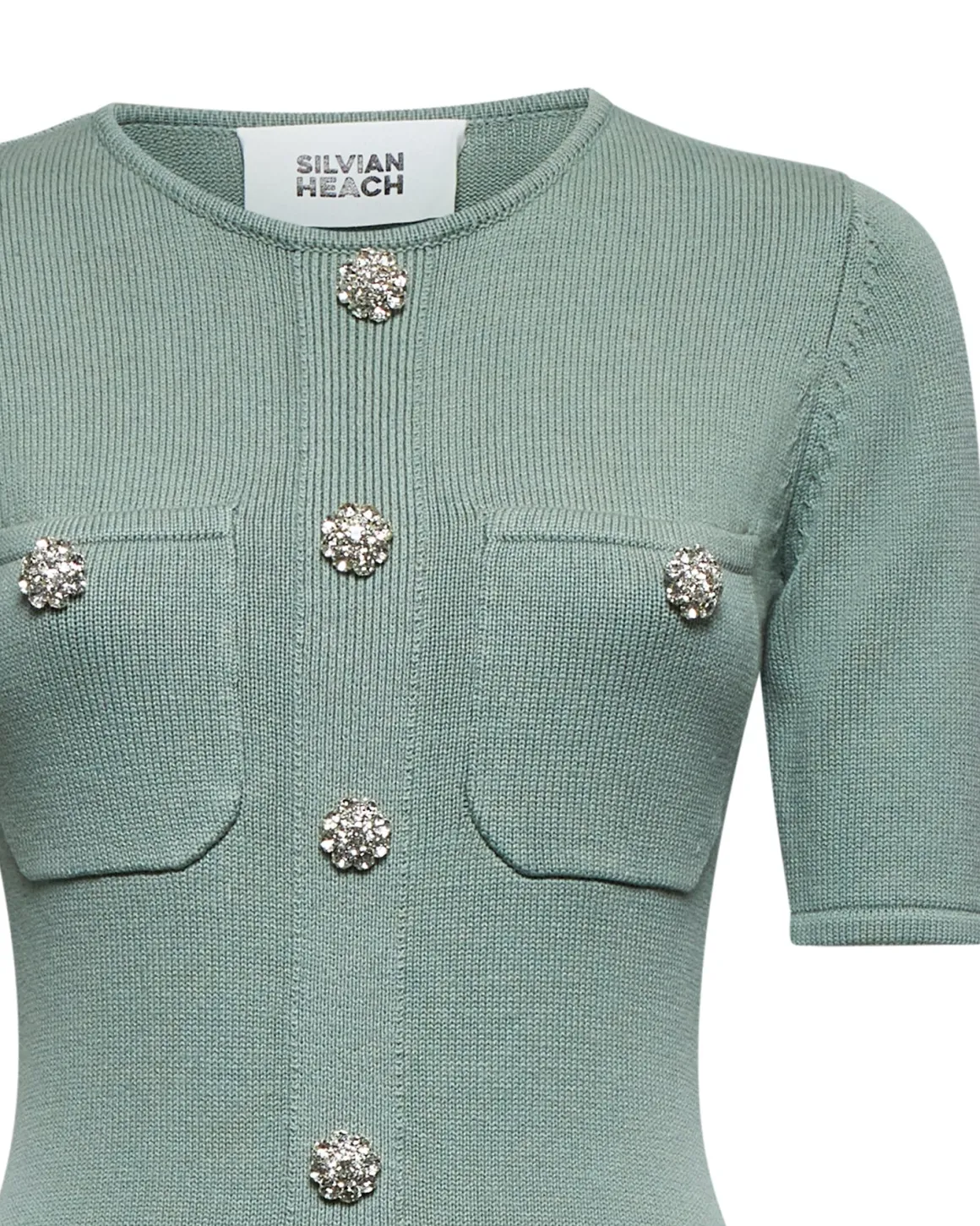 Fitted dress with decorative buttons