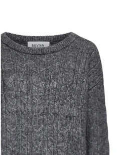 Melange sweater with raised workmanship