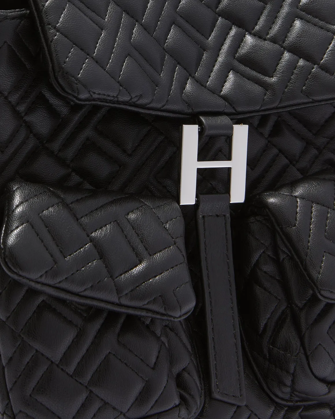 Quilted eco -leather backpack with flap closure
