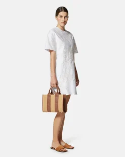 Short dress with contrasting decorative embroidery