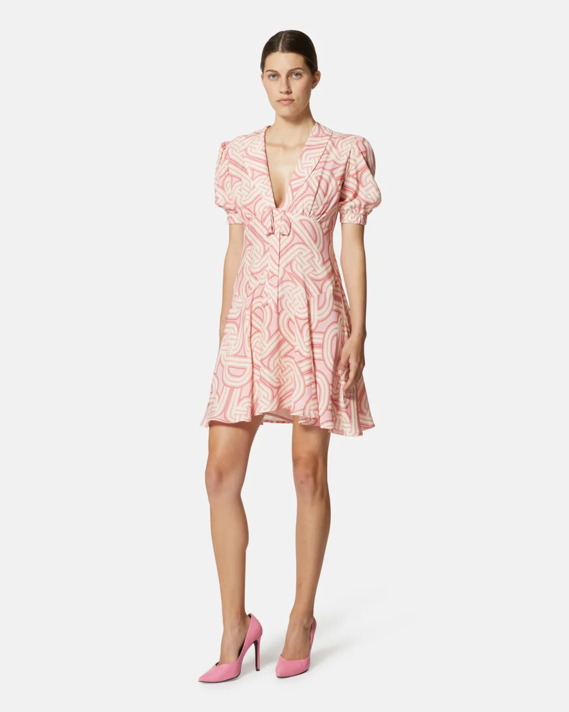 Short dress with geometric print and central bow