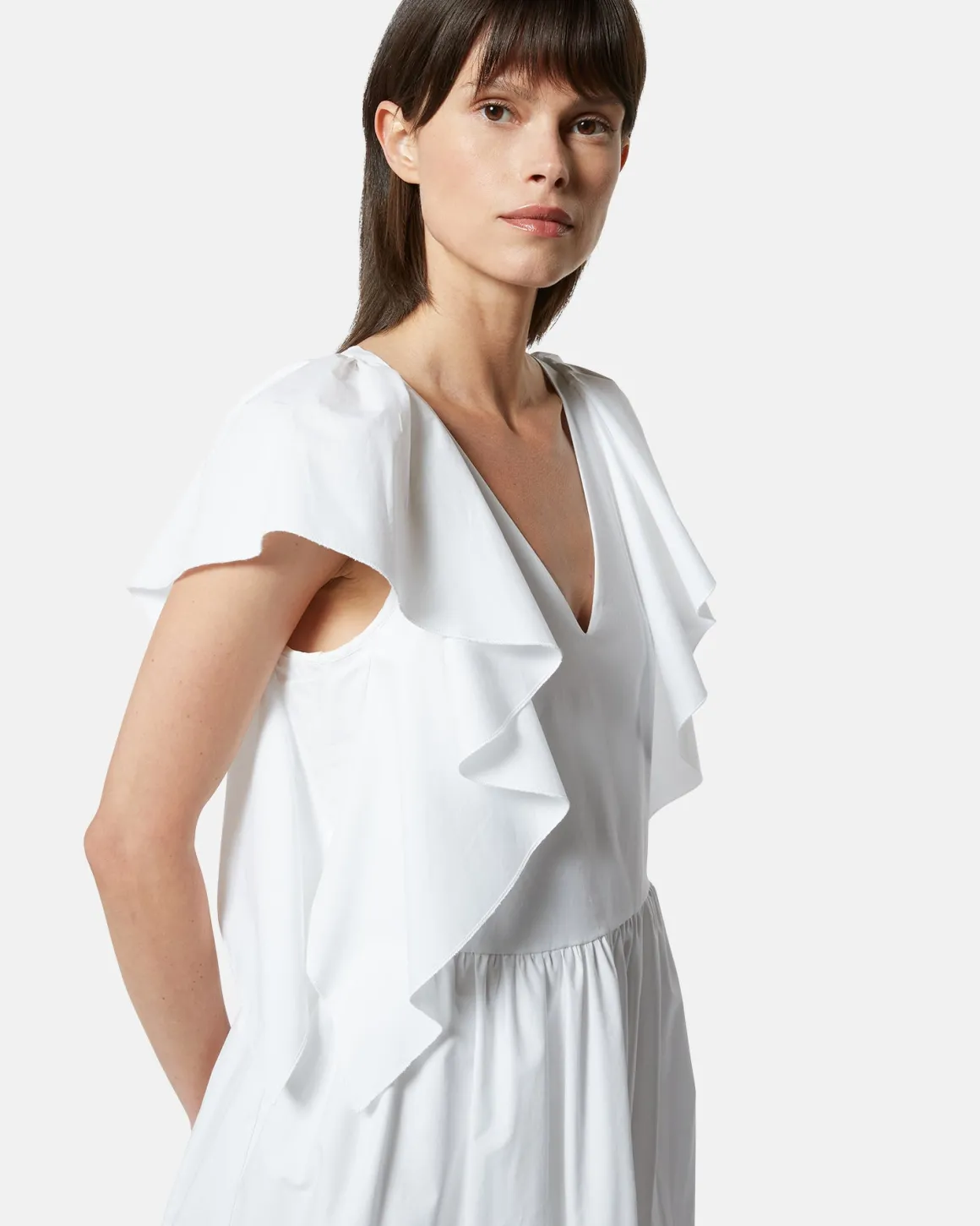Short dress with V -neck and decorative ruffles