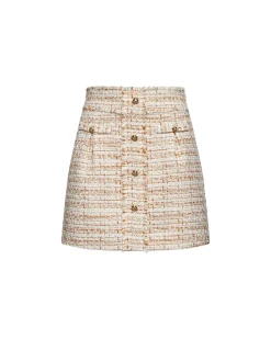 Short skirt with decorative buttons