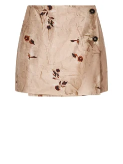 Short skirt with floral pattern and decorative buttons