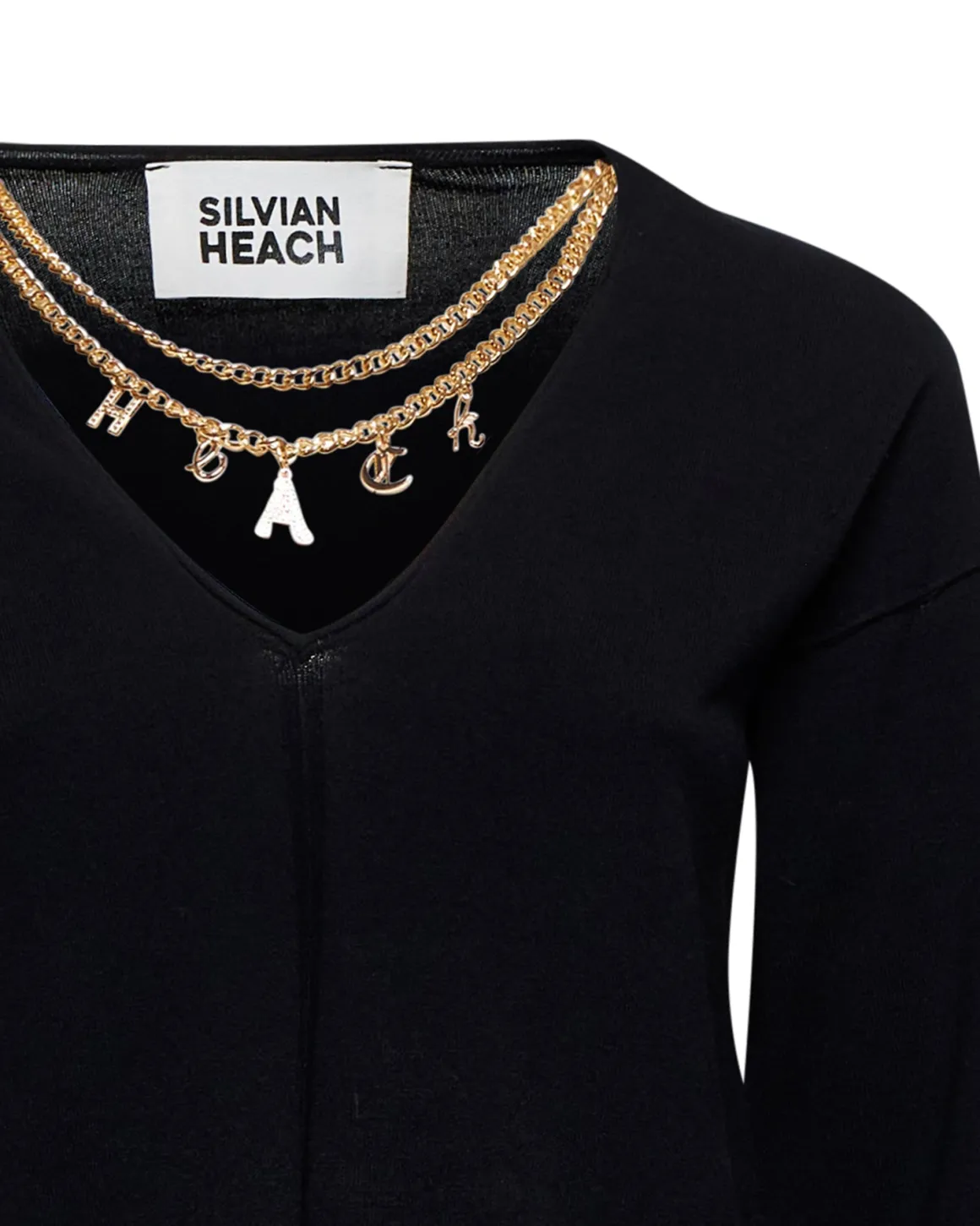 Sweater with decorative chain