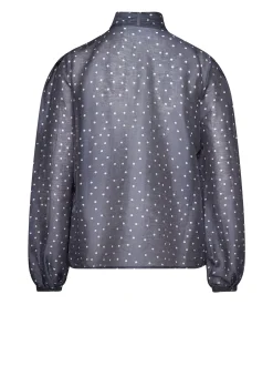 Top with micro-polka dot pattern and architectural design