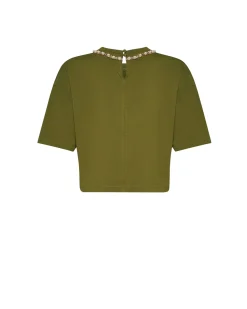 Top with neckline embellished with decorative applications