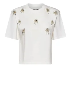 T-shirt with iconic decorative applications