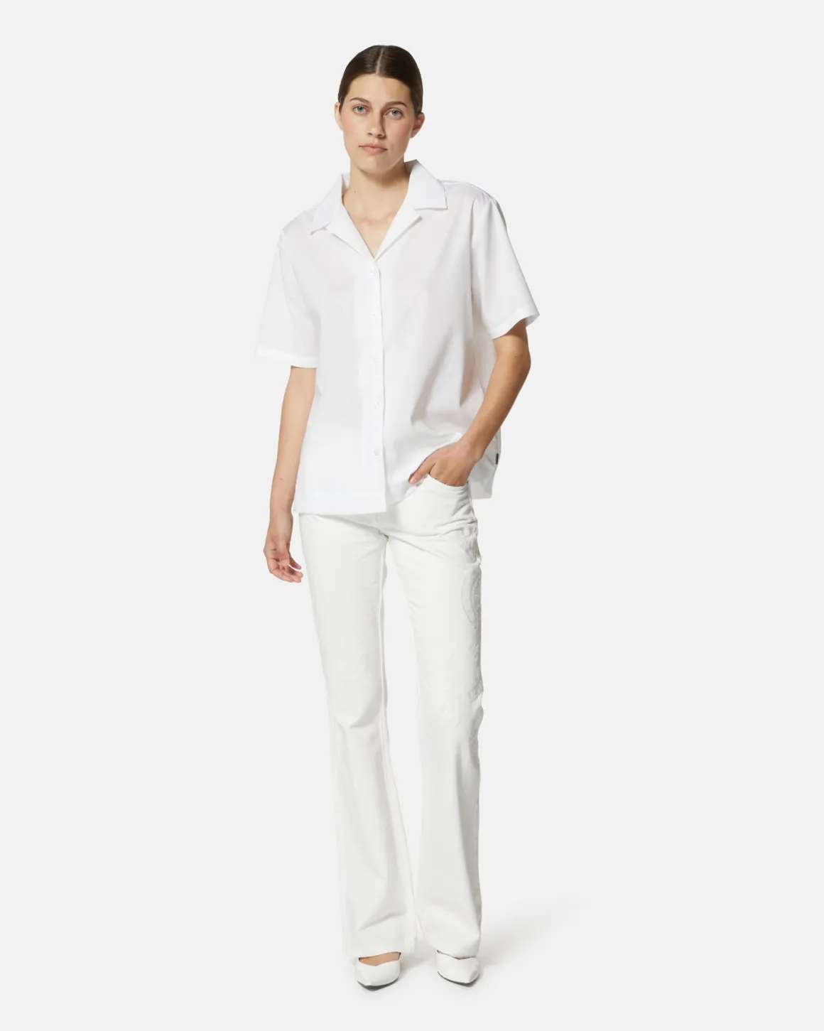 White embroidered jeans with straight leg
