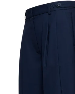 Wide trousers with structured pleats